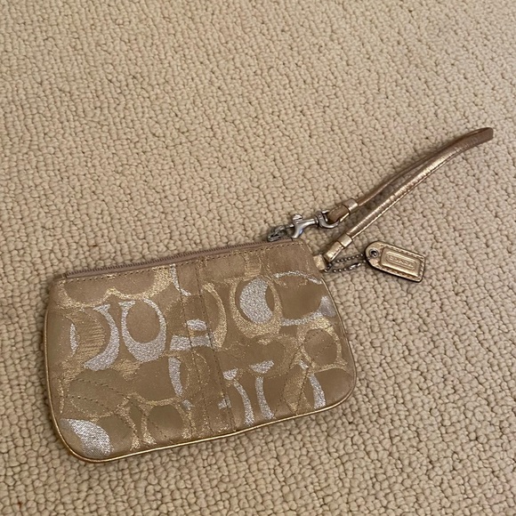 Coach Handbags - Coach gold wristlet